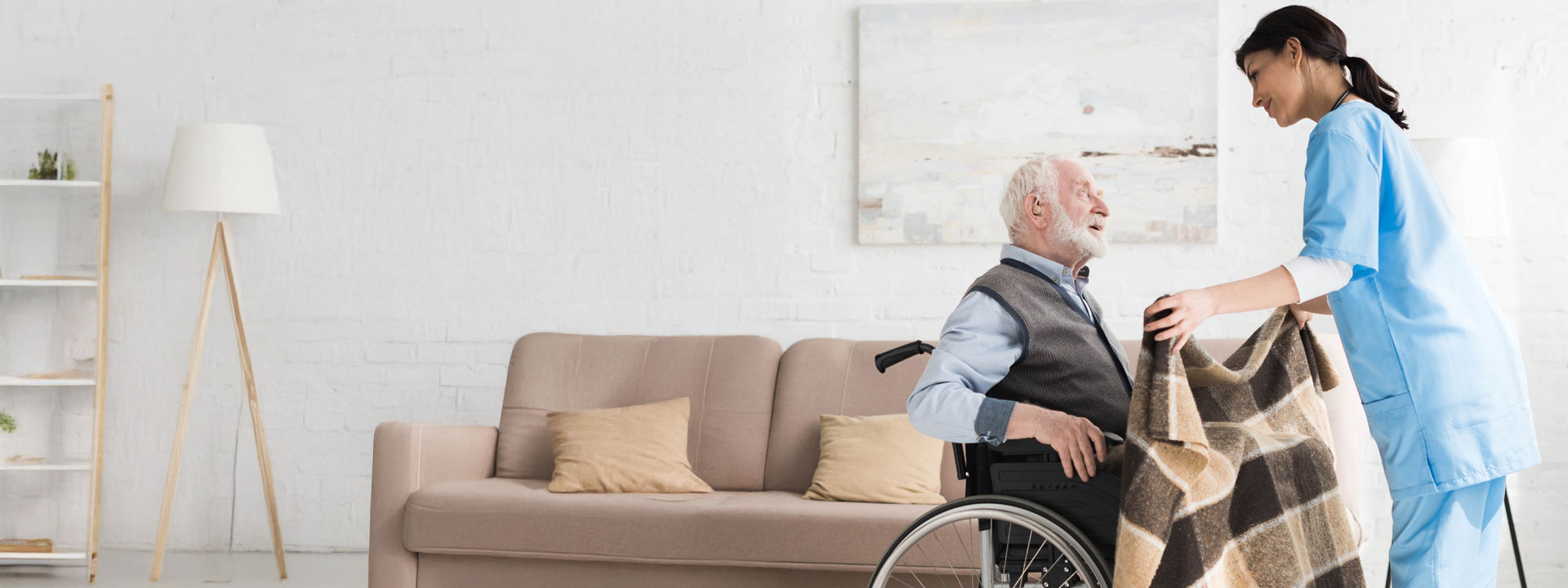 A home care aide helping with homemaking support